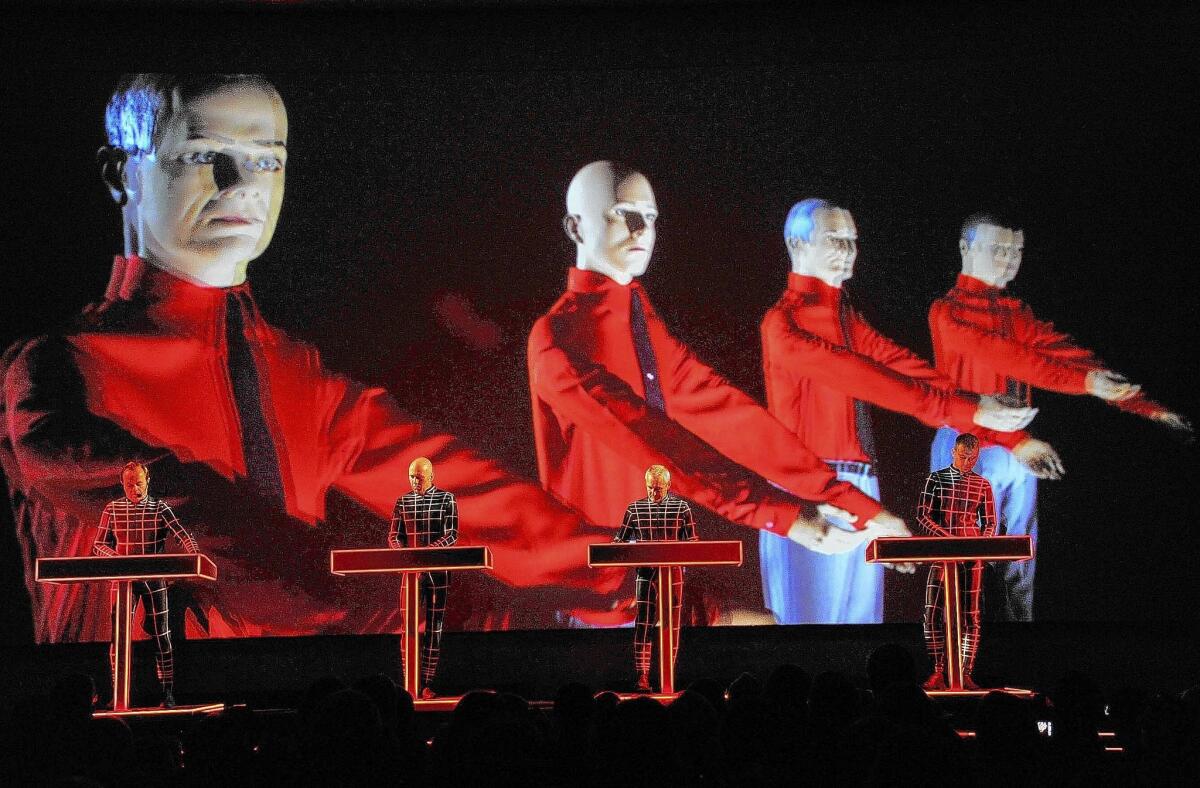 Ralf HŸtter, left, Henning Schmitz, Fritz Hilpert and Stefan Pfaffe of Kraftwerk at the Museum of Modern Art on April 10, 2012, in New York City.