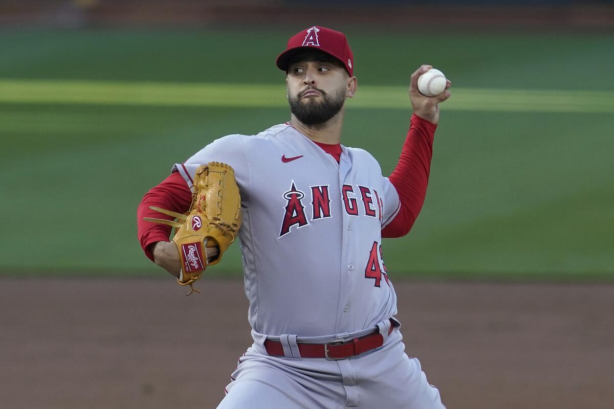 Los Angeles Angels' Patrick Sandoval pitches against the Oakland Athletics during the first inning.