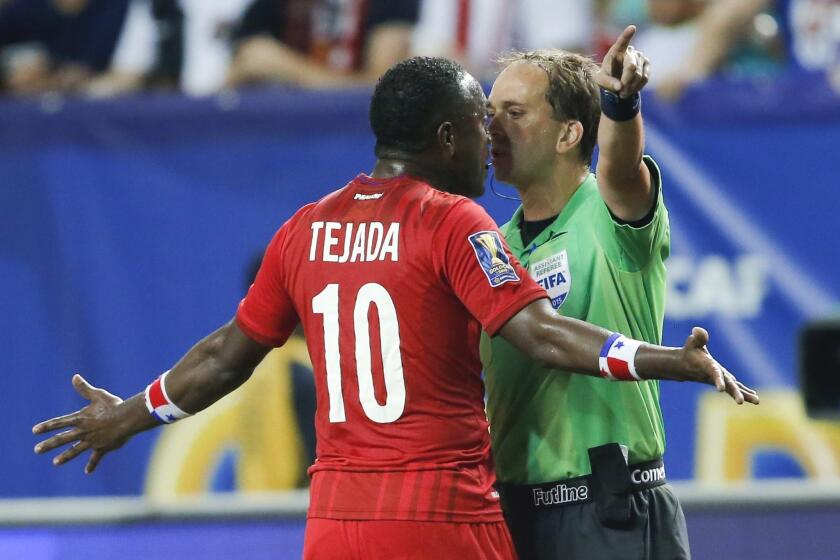 Panama's Luis Tejada (10) argues with an official during the first half against Mexico in a CONCACAF Gold Cup soccer semifinal, Wednesday, July 22, 2015, in Atlanta. (AP Photo/John Bazemore)