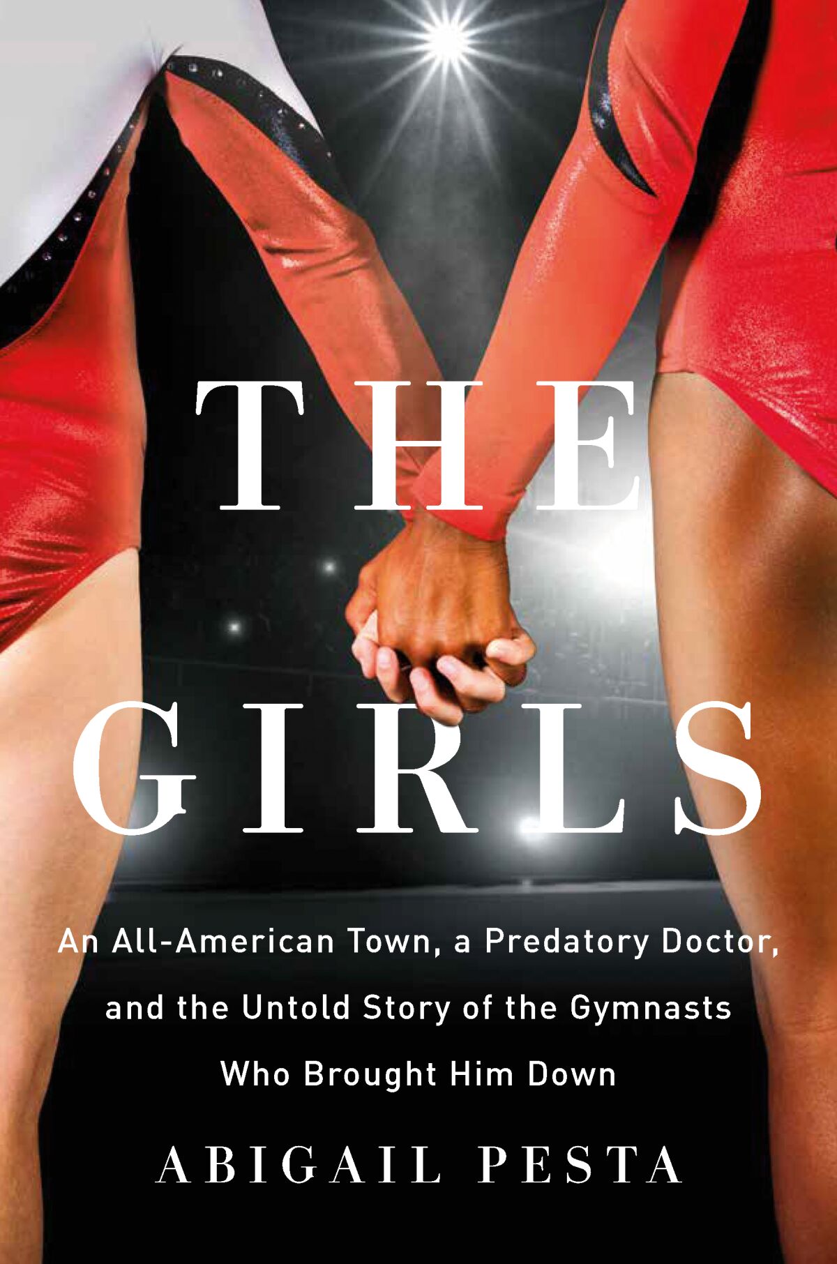 "The Girls: An All-American Town, a Predatory Doctor, and the Untold Story of the Gymnasts Who Brought Him Down" by Abigail Pesta. 