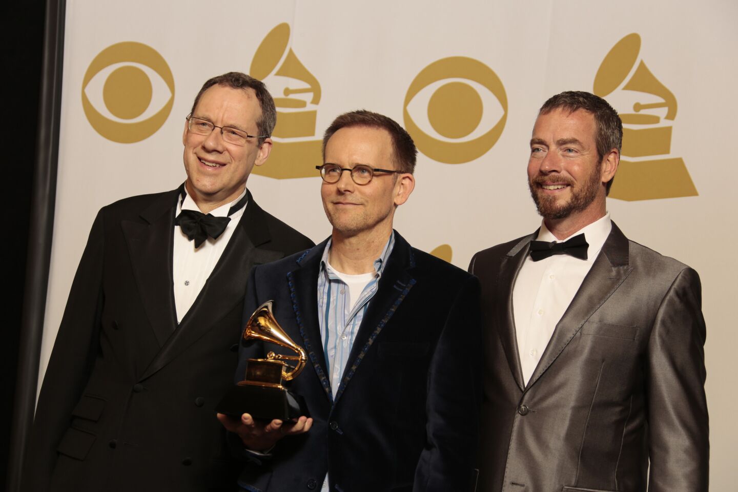 From left, singer Glenn Miller, conductor Craig Hella Johnson and singer Robert Harlan win choral performance for "The Scared Spirit of Russia."