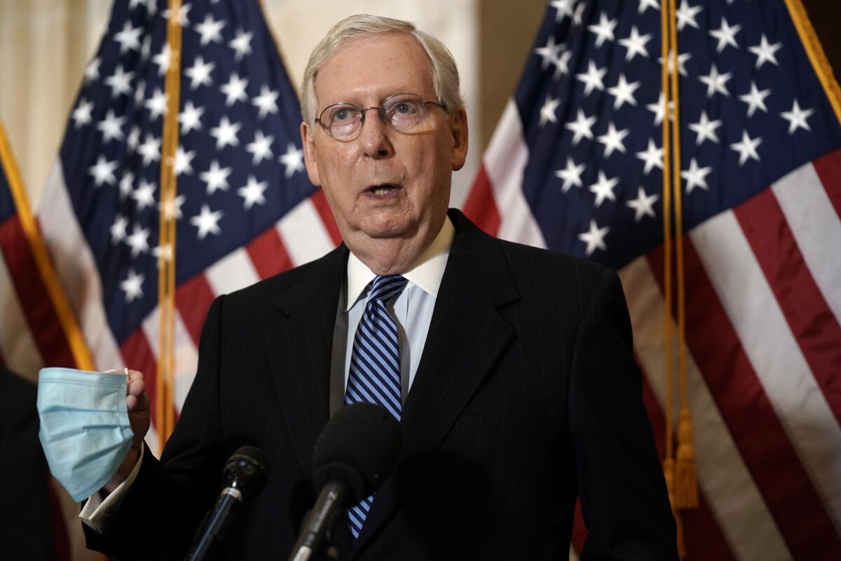 Senate Majority Leader Mitch McConnell of Ky., answers questions after Senate Republicans held leadership elections, on Capitol Hill in Washington, Tuesday, Nov. 10, 2020. (AP Photo/J. Scott Applewhite)