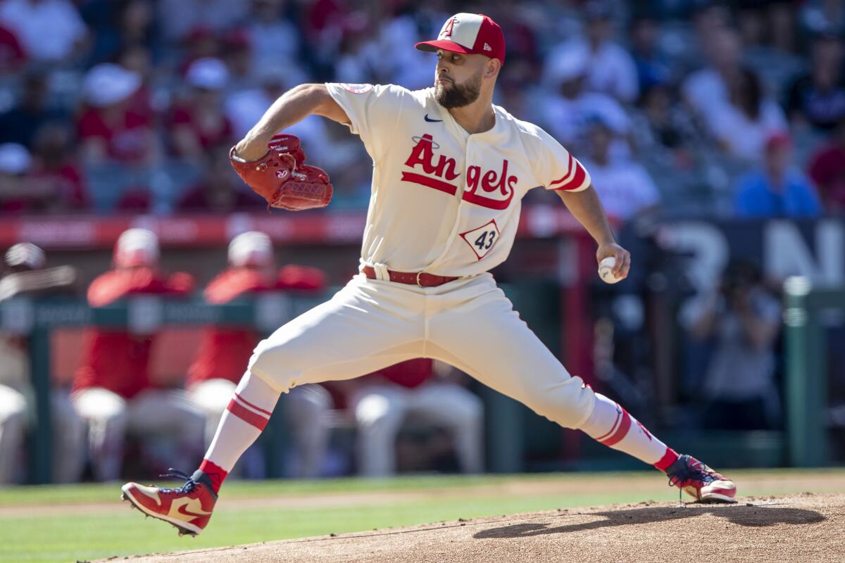 Angels starting pitcher Patrick Sandoval delivers during the first inning of Sunday's loss to the New York Mets.