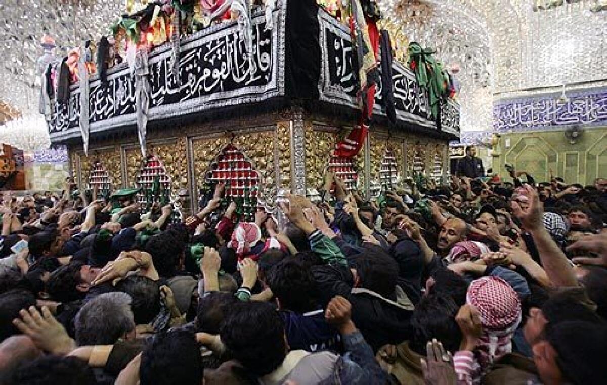 Shiite pilgrims throng a holy site in Karbala, Iraq, on Saturday. Shiites are making their annual pilgrimage to Karbala to mark the end of 40 days of mourning following the anniversary of the 7th century death of Imam Hussein, a grandson of the Prophet Mohammed. More photos >>>