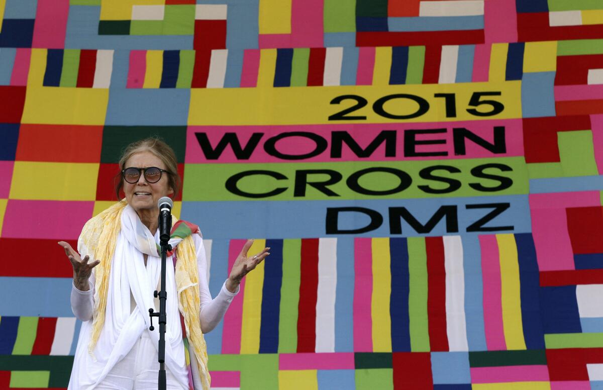 U.S. activist Gloria Steinem and two Nobel Peace Prize laureates were among a group of 30 women denied permission to walk across the Demilitarized Zone from North to South Korea on May 24. They were allowed to cross by bus and complete what one of them called a landmark peace event.