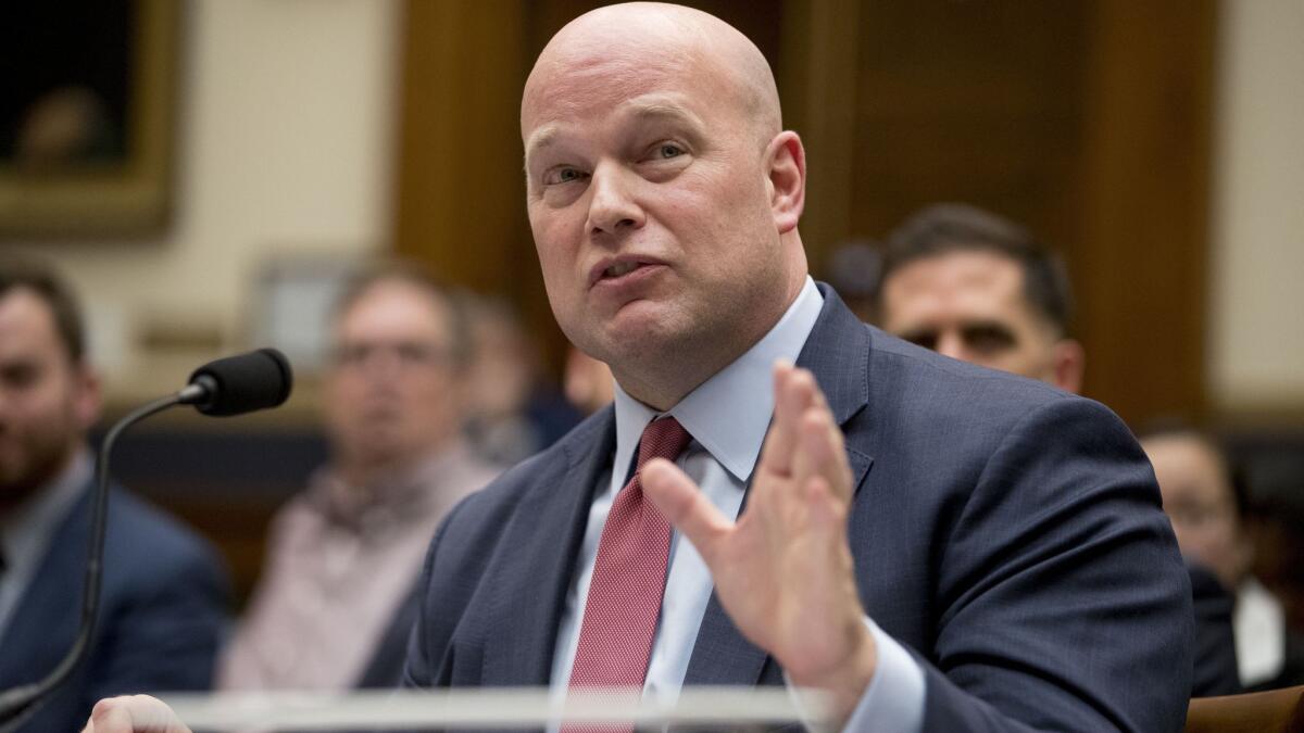 Former acting Atty. Gen. Matthew Whitaker speaks during a House Judiciary Committee hearing on Capitol Hill in Washington on Feb. 8.