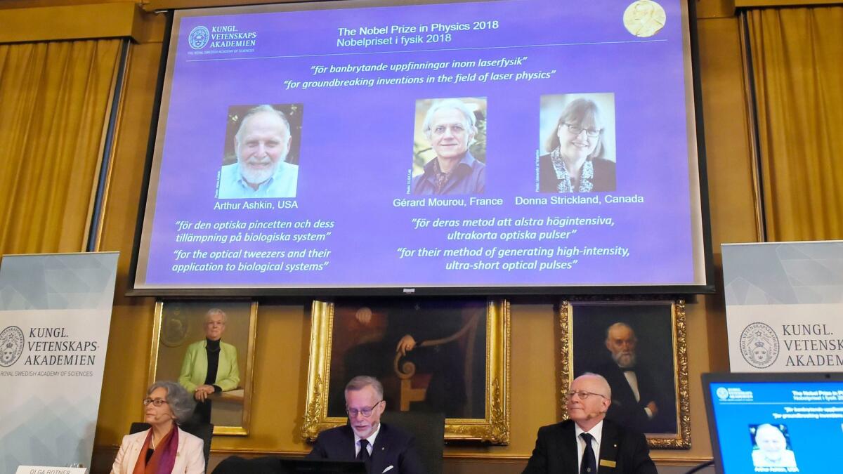Members of the Nobel committee announced that Arthur Ashkin of the U.S., Gerard Mourou of France and Donna Strickland of Canada won the physics prize for their pioneering work on lasers.