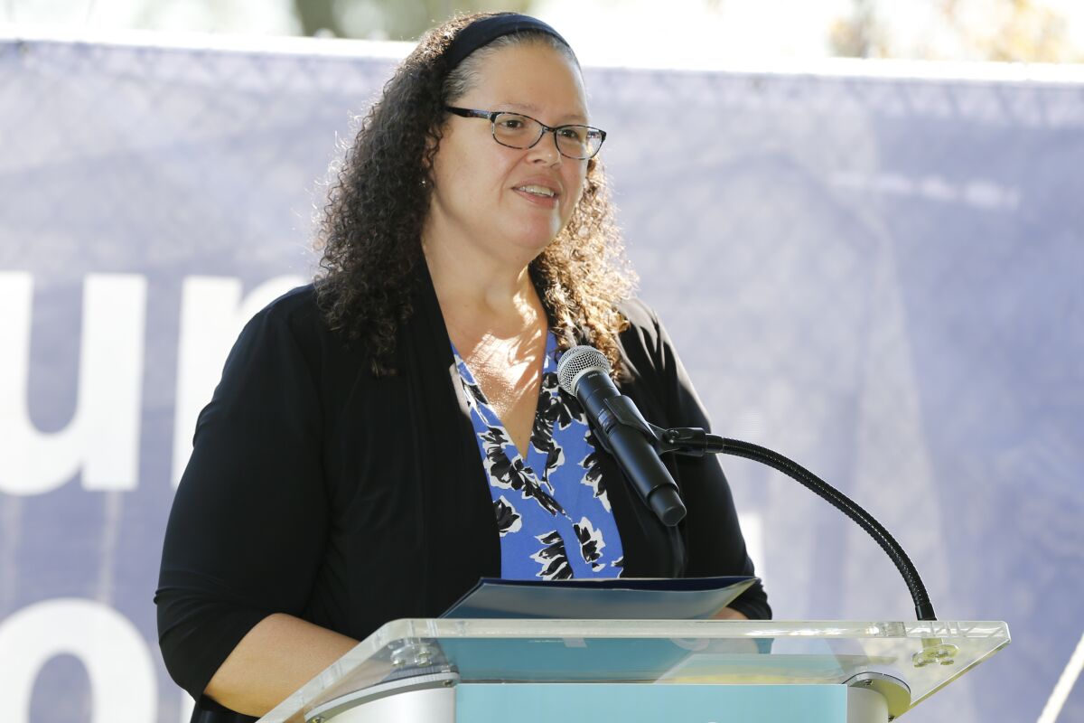 FILE - Annette Chambers-Smith, director of the Ohio Department of Rehabilitation and Correction, speaks during a groundbreaking celebration for the Alvis House expansion and renovation project Friday, Sept. 24, 2021, in Columbus, Ohio. The Ohio prisons system has announced its plan to deploy more than 5,000 body-worn cameras in all state prisons and adult parole authority offices. Chambers-Smith said Thursday, Jan. 13, 2022, the cameras are another tool for the agency to help protect both staff members and inmates. . (AP Photo/Jay LaPrete)