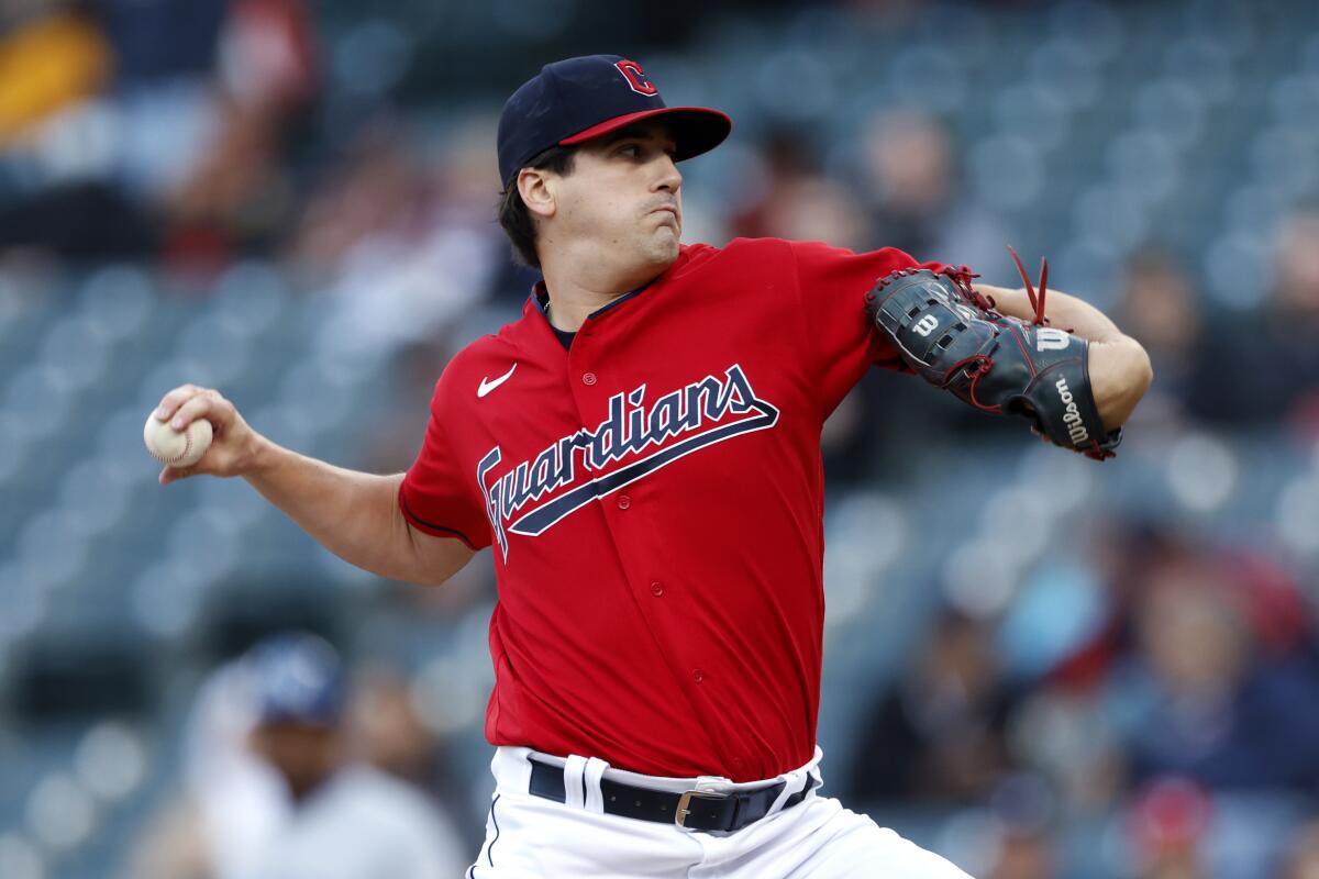 Cleveland Guardians starting pitcher Cal Quantrill delivers against the Kansas City Royals during the first inning of a baseball game Tuesday, Oct. 4, 2022, in Cleveland. (AP Photo/Ron Schwane)