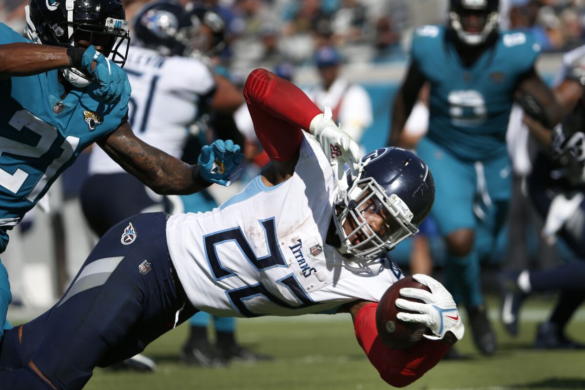 Tennessee Titans running back Derrick Henry dives for a touchdown against the Jacksonville Jaguars.