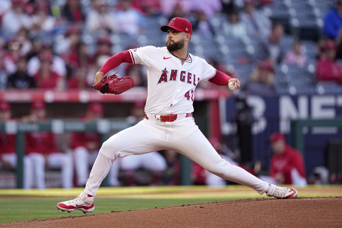 Angels starting pitcher Patrick Sandoval delivers during the first inning against the Cleveland Guardians at Angel Stadium.