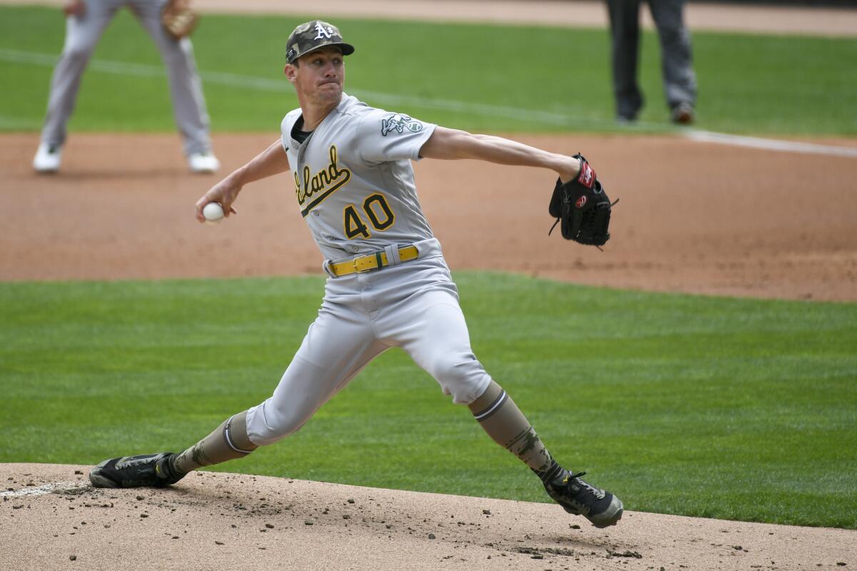 Oakland Athletics pitcher Chris Bassitt throws against the Minnesota Twins on May 16.