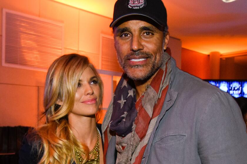 AnnaLynne McCord and Rick Fox attend the Hennessy Lounge at the W Hotel in Scottsdale, Ariz., on Thursday.