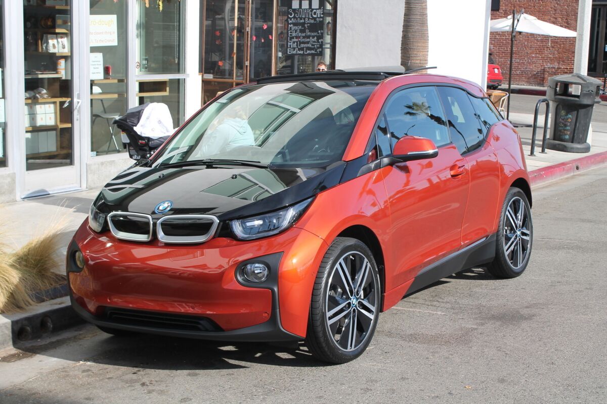 Global production of electric vehicles will rise 67% in 2014, according to a new report by IHS Automotive. Above, the BMW i3.