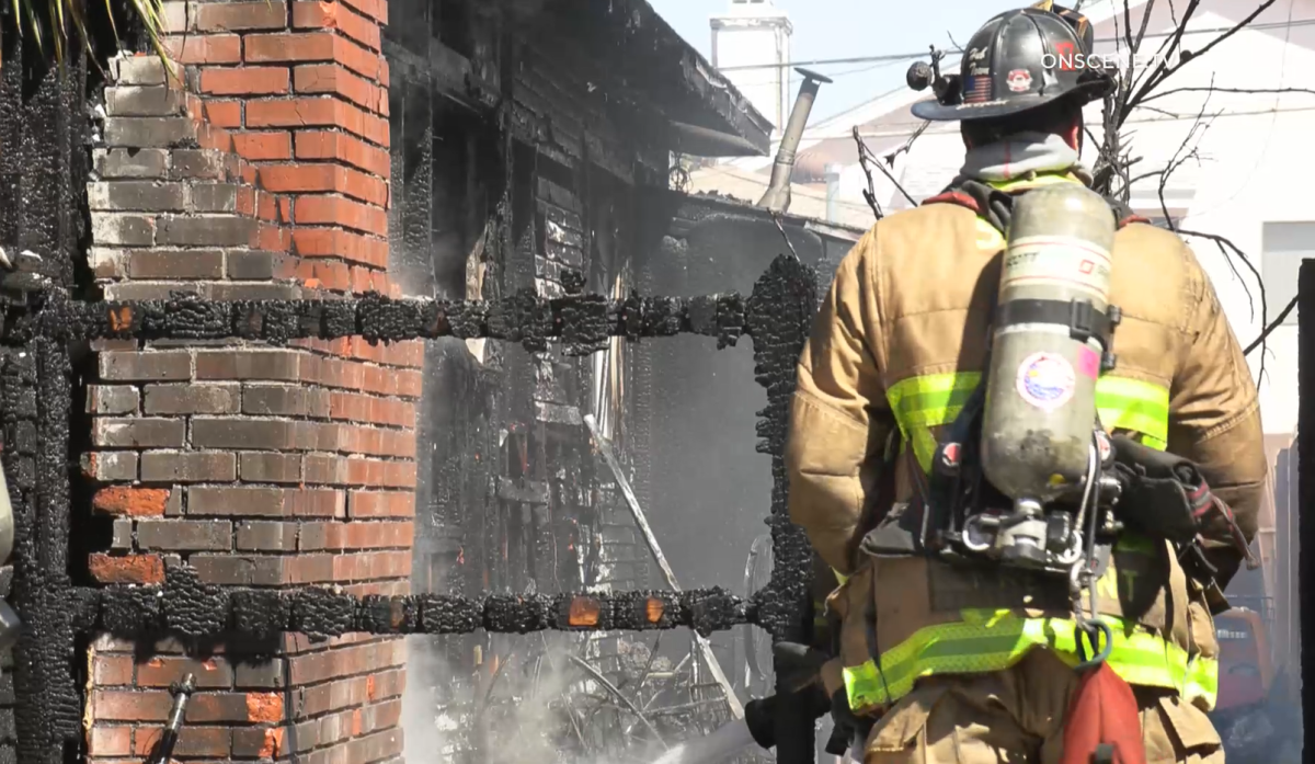 Firefighters extinguished a fire that damaged a house in City Heights Tuesday.