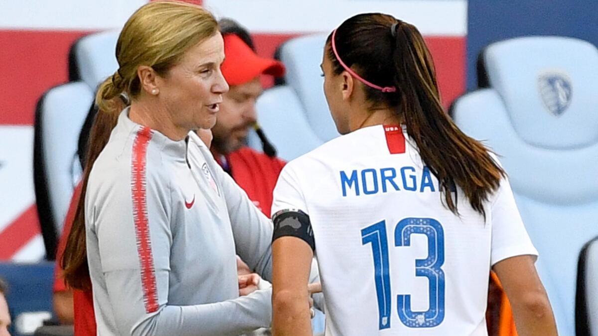U.S. coach Jill Ellis speaks to star forward Alex Morgan during a Tournament of Nations games in Kansas City, Kan., on July 26.