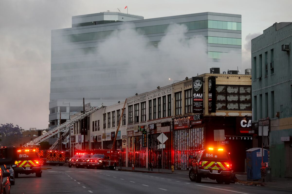 An explosion in downtown Los Angeles injured multiple firefighters.