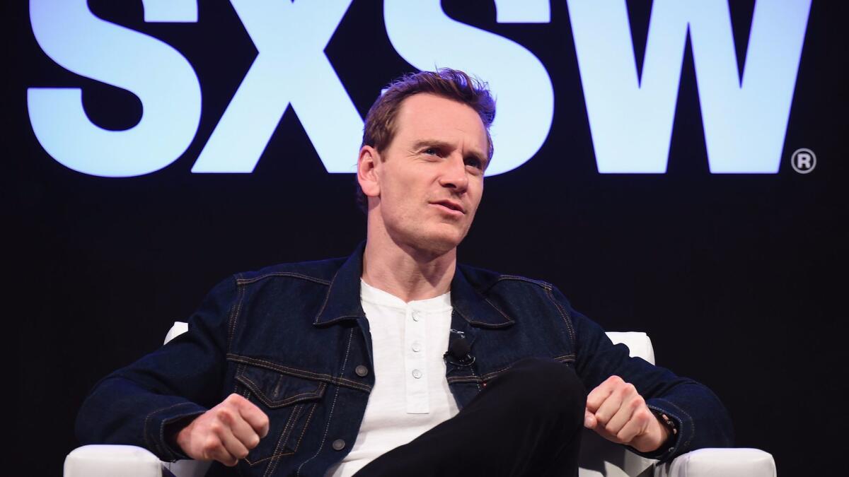 Michael Fassbender sits on the SXSW panel Made in Austin: A Look Into "Song to Song," where director Terrence Malick made a surprise visit.
