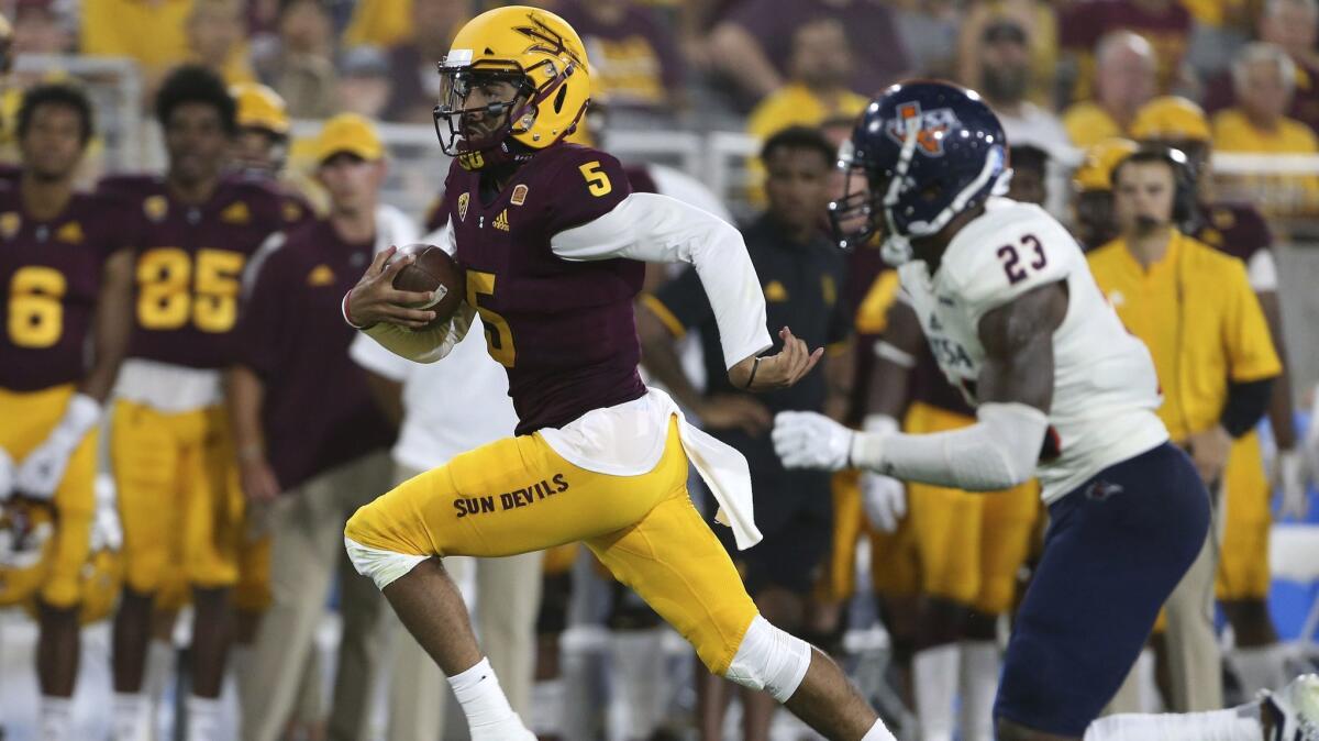 Arizona State quarterback Manny Wilkins (5) runs the ball against Texas San Antonio during the second half on Saturday in Tempe, Ariz.