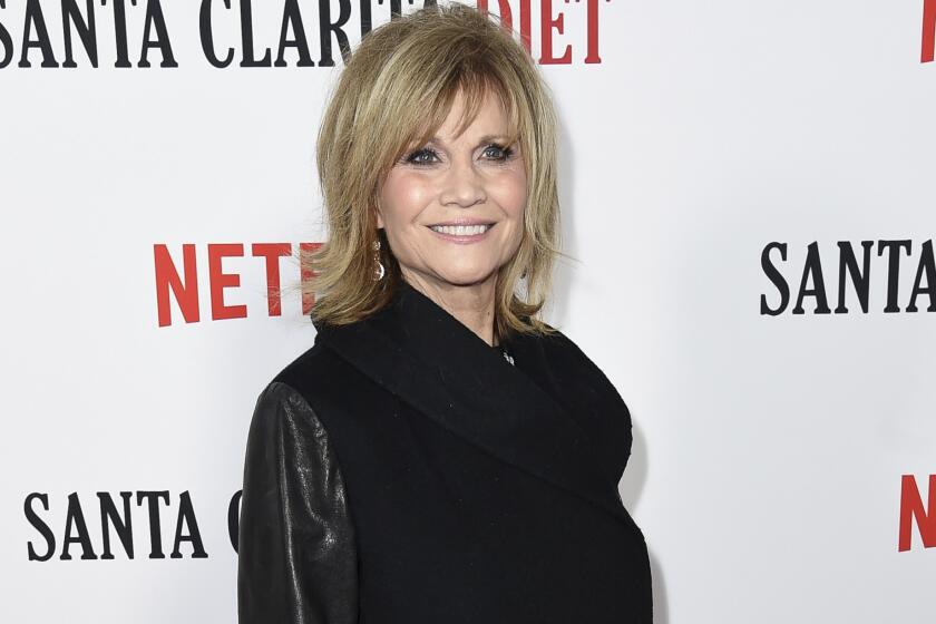 FILE - Actress Markie Post attends the premiere for season two of "Santa Clarita Diet" in Los Angeles on March 22, 2018. Post, who played the public defender in the 1980s sitcom “Night Court” and was a regular presence across several decades of television died Saturday after a years-long battle with cancer. She was 70. (Photo by Richard Shotwell/Invision/AP, FIle)