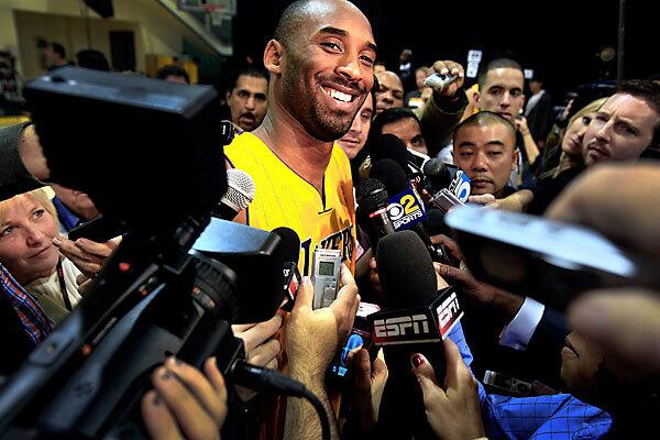 Lakers All-Star guard Kobe Bryant takes questions during media day at the team's El Segundo training facility on Sunday.