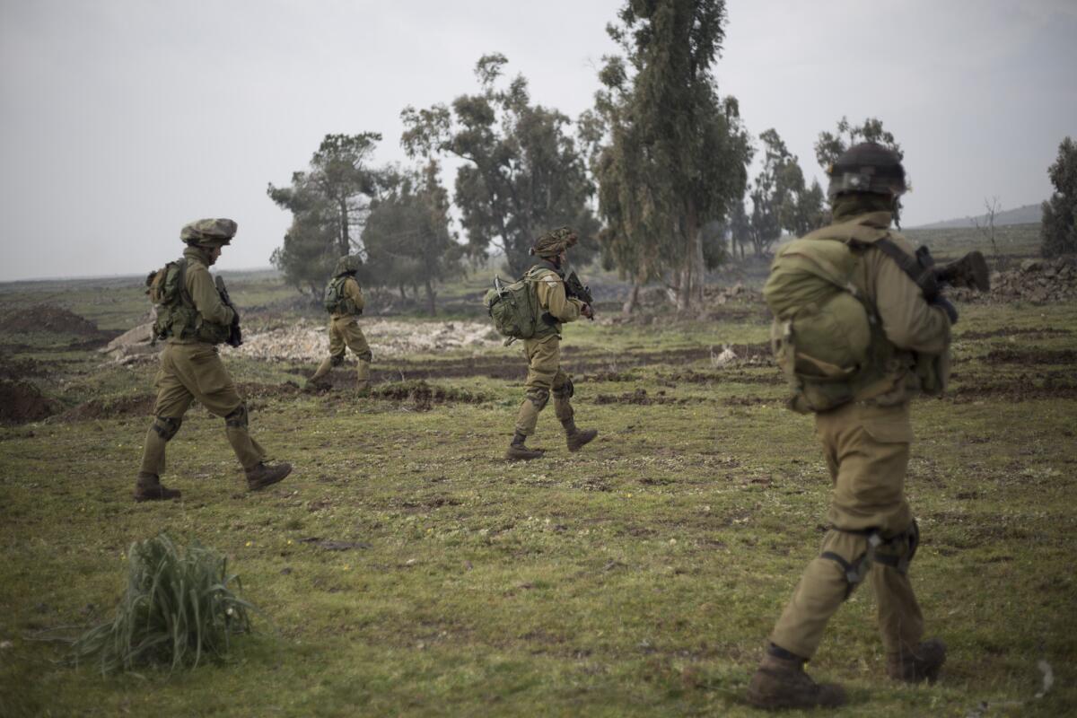 Israeli soldiers march during training in the Israeli-controlled Golan Heights on Jan. 19.