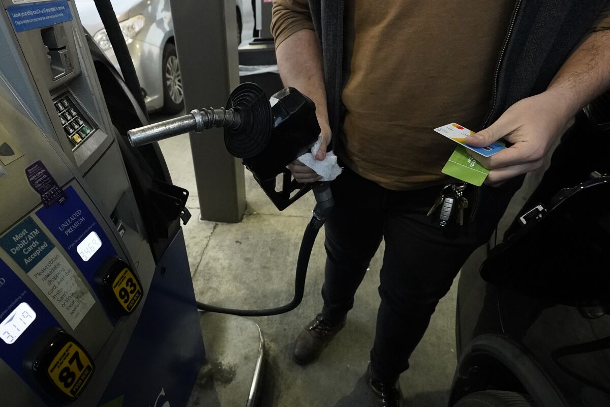 A customer prepares to pump gasoline into his car at a Sam's Club fuel island in Gulfport, Miss., Feb. 19, 2022. For the 12 months ending in March, consumer prices surged 8.5% — posting the fastest year-over-year pace since December 1981 and topping February's previous 40-year high of 7.9%, the Labor Department said Tuesday, April 12. Even if you toss out volatile food and energy prices, so-called core inflation jumped 6.5% in March from a year earlier. That was also the sharpest such jump in four decades.(AP Photo/Rogelio V. Solis)