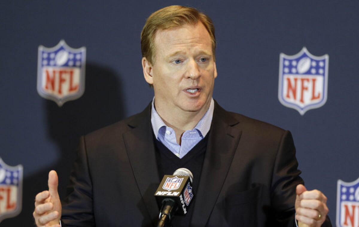 NFL Commissioner Roger Goodell answers questions during a news conference at the conclusion of the league's annual meeting Wednesday in Orlando, Fla. Goodell says he thinks "there's a tremendous amount of interest" in expanding the NFL postseason.