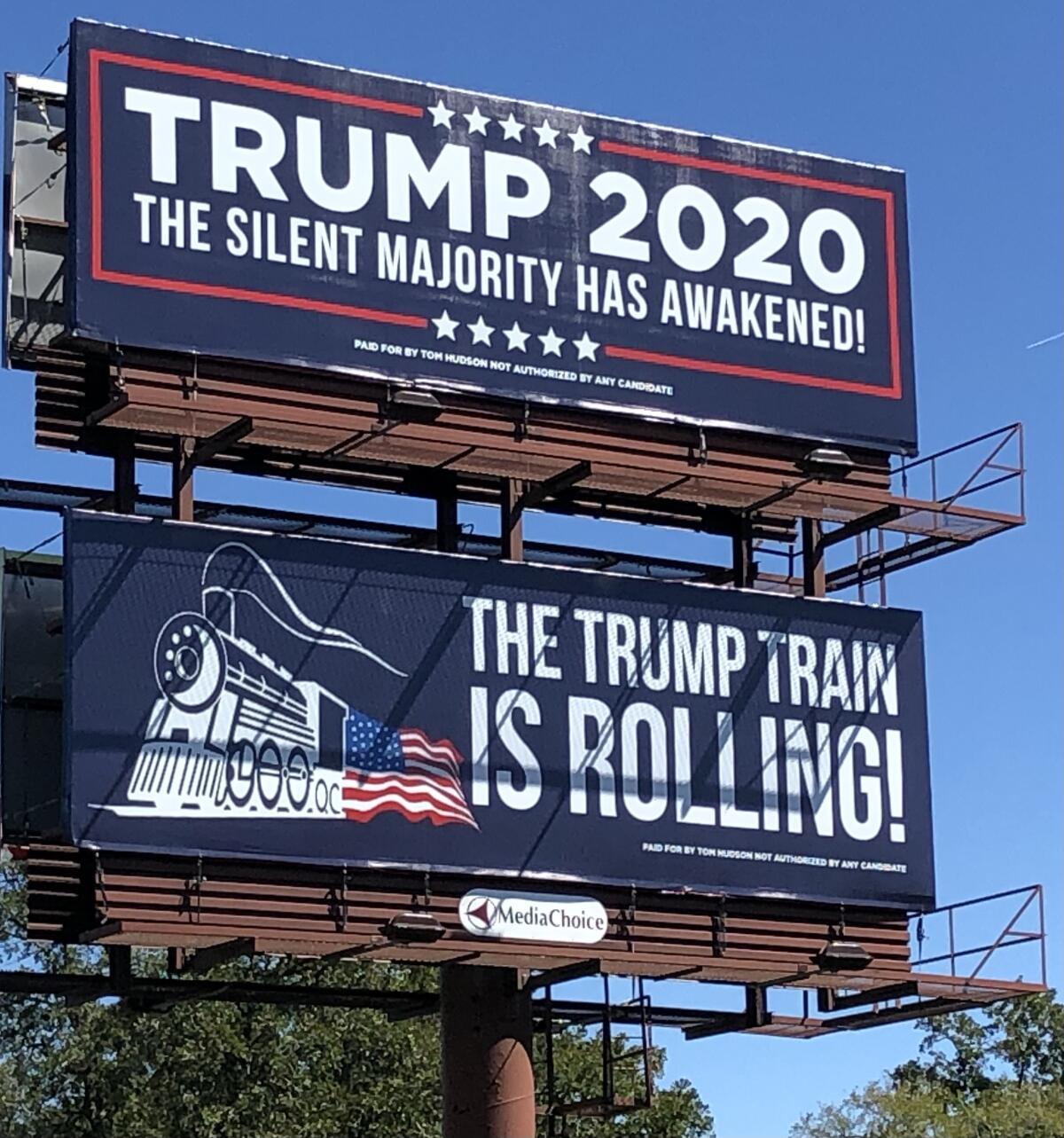 Billboards between Houston and Austin read, "Trump 2020: The silent majority has awakened!" and "The Trump train is rolling!"