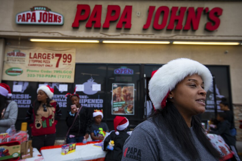 Column They Signed A Contract On A Papa John S Franchise Then Controversy Erupted Los Angeles Times