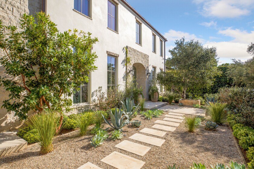 Built in 2019, the French-style manor blends modern and Old World influences across more than 10,000 square feet.