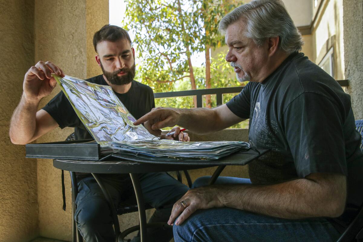 Joseph Arriaga, 28, left, reunites with his biological father Robert 'Bobby' Parker, 52, on May 4, 2021, in Riverside.