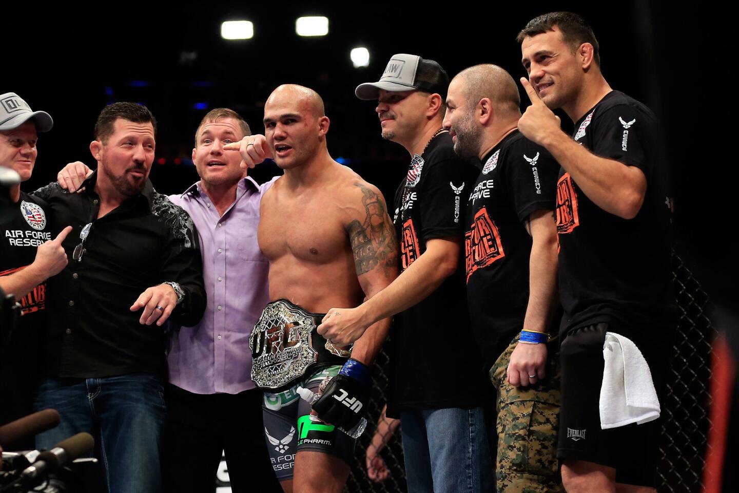 Robbie Lawler celebrates after earning the UFC welterweight belt Saturday by defeating Johny Hendricks in Las Vegas.