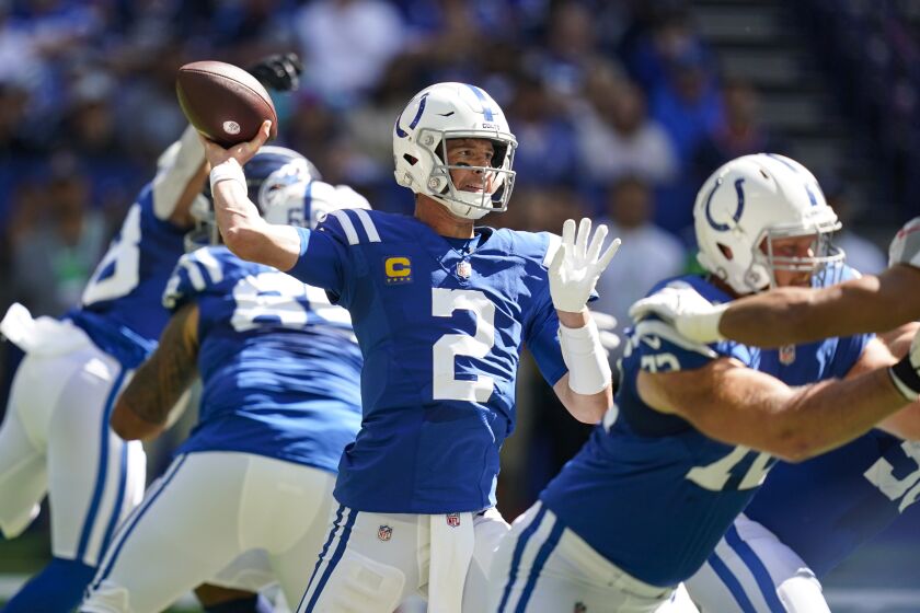 Indianapolis Colts quarterback Matt Ryan throws against the Tennessee Titans in the first half of an NFL football game in Indianapolis, Fla., Sunday, Oct. 2, 2022. (AP Photo/Darron Cummings)