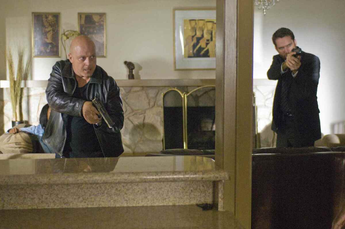 Michael Chiklis is Det. Vic Mackey, left, and David Rees Snell is Det. Ronnie Gardocki in "The Shield," which has just secured a streaming home on Hulu.