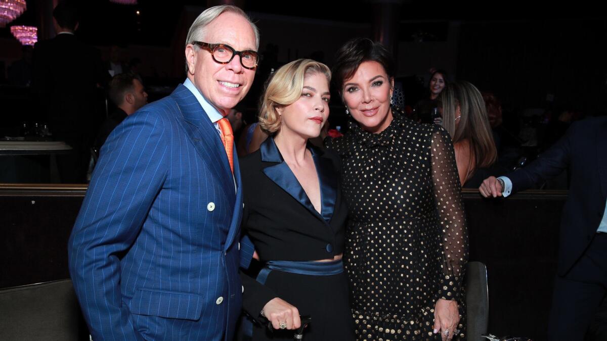 Tommy Hilfiger, from left, honoree Selma Blair and Kris Jenner attend the 26th Race to Erase MS gala in Beverly Hills on Friday night.