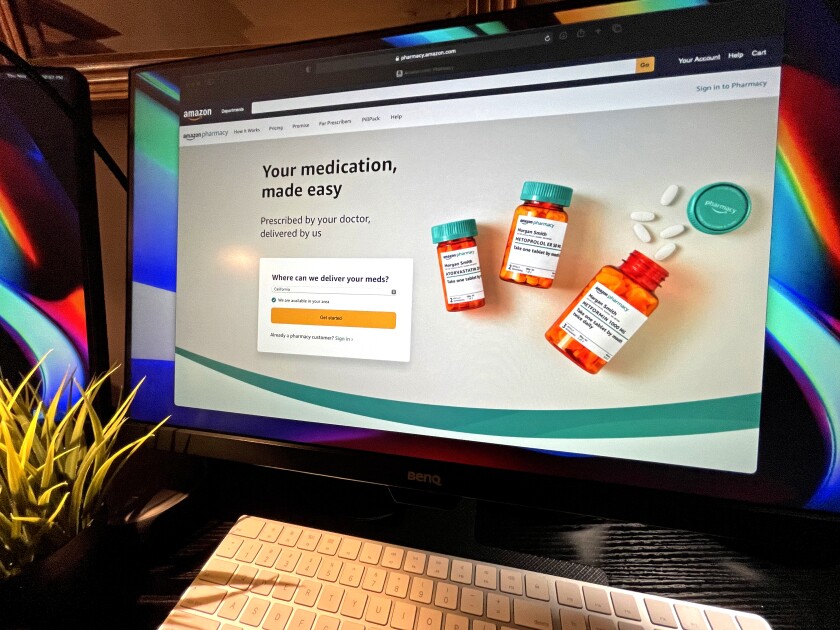 A computer screen shows a web page for the new Amazon Pharmacy