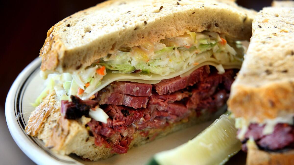 The No. 19 sandwich at Langer's Deli. A customer has accused owner Norm Langer of asking her to leave because she's gay. Langer denies the claim.