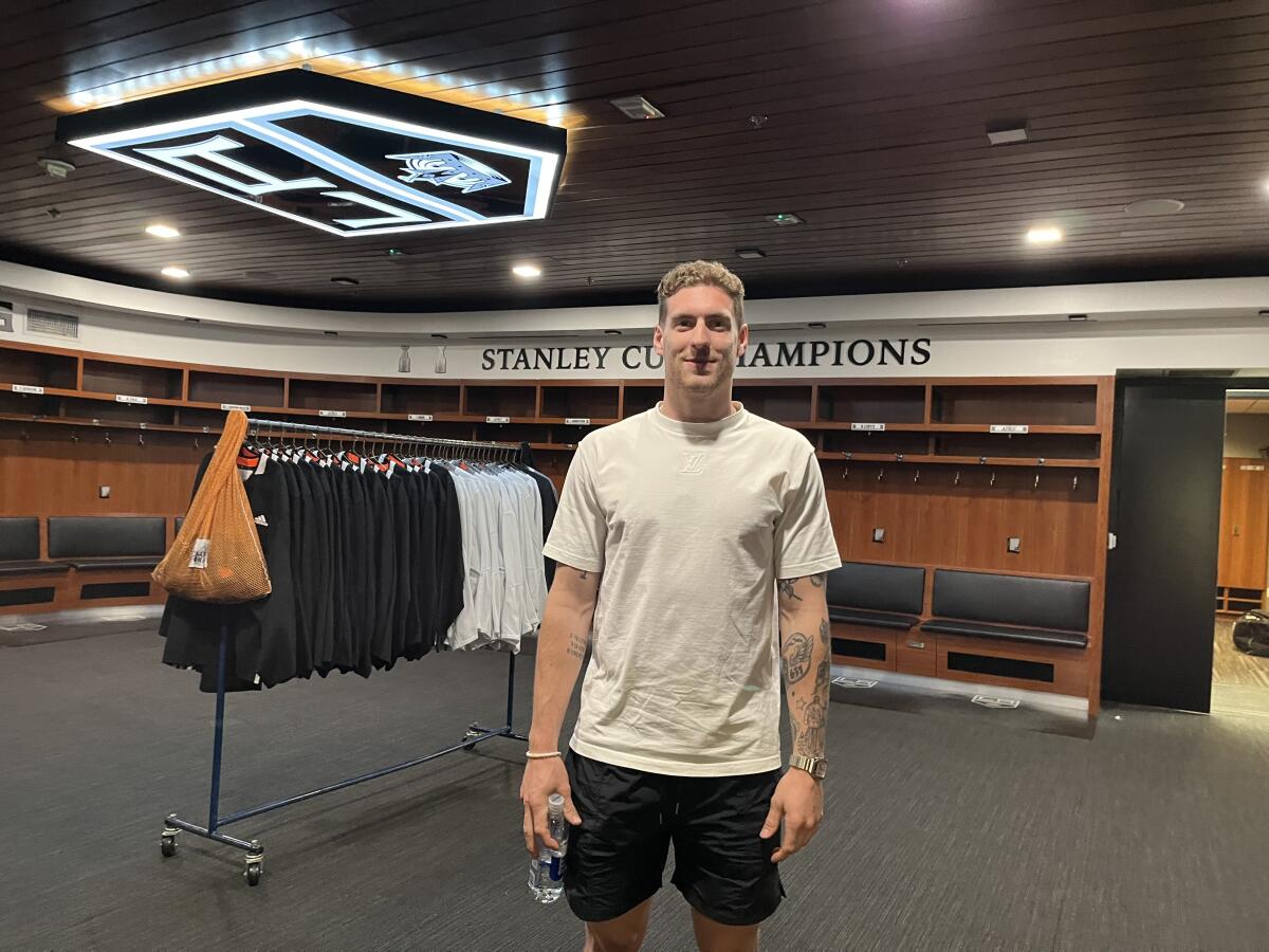 Pierre-Luc Dubois, checking out the Kings locker room, signed an eight-year contract worth $8.5 million a season.