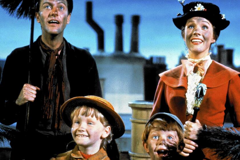 Dick Van Dyke as Bert, Julie Andrews as Mary Poppins, Karen Dotrice as Jane Banks and Matthew Garber as Michael Banks in "Mary Poppins" from 1964.