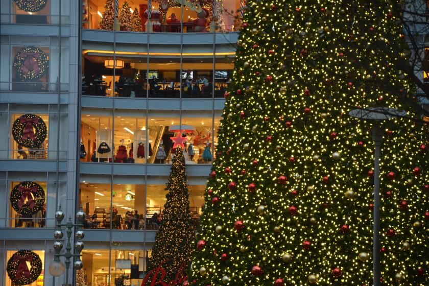 Every year as December draws near, the shops at San Francisco's Union Square lay in the lights and wreaths. That's Macy's behind the big Christmas tree. Photo taken 2012.