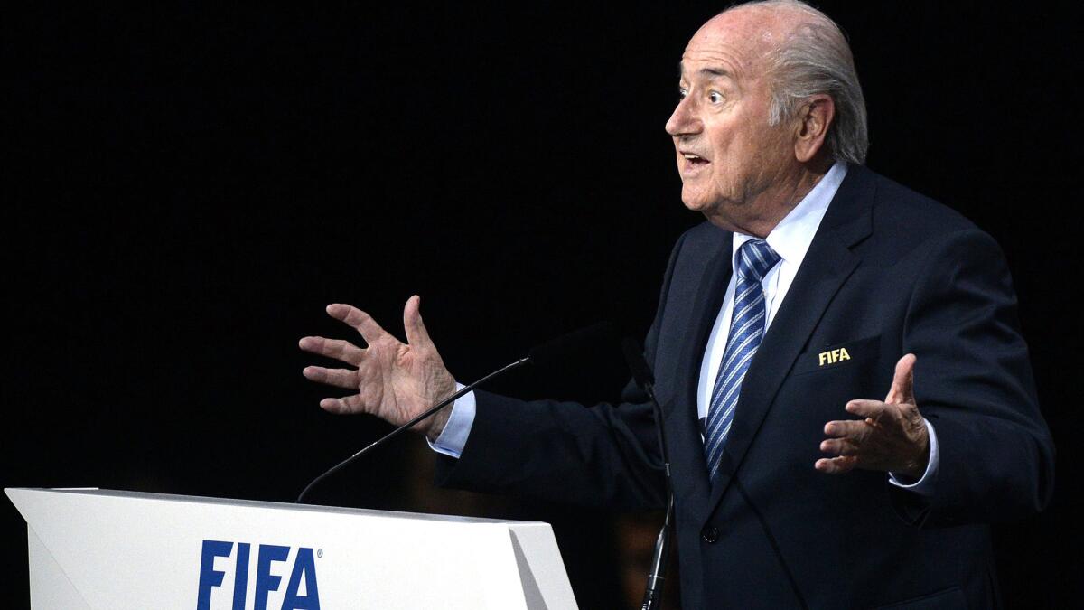 President Sepp Blatter speaks to delegates at the 65th FIFA Congress on Friday in Zurich, Switzerland.