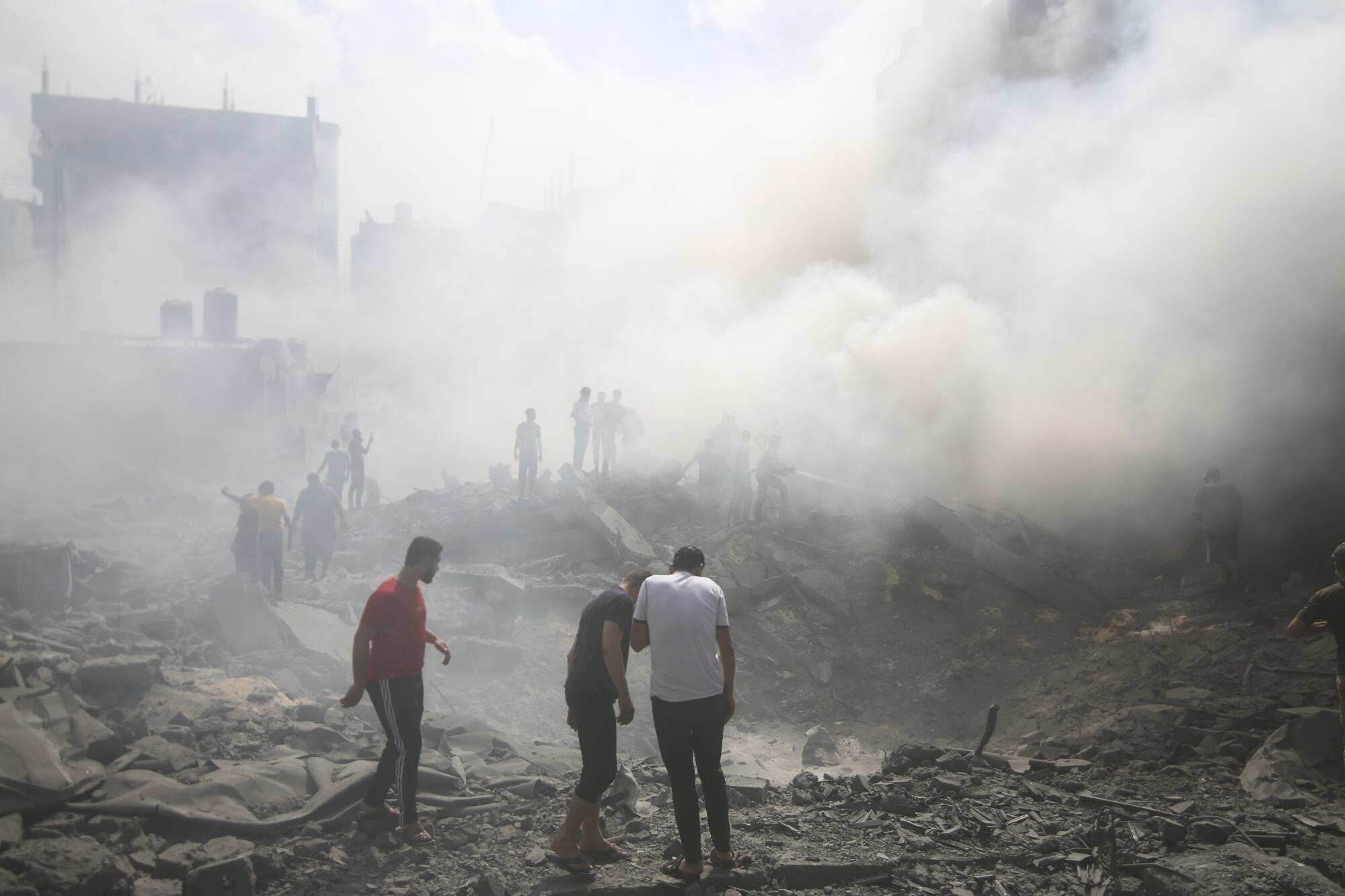 Smoke and dust in the air after an Israeli strike on Gaza