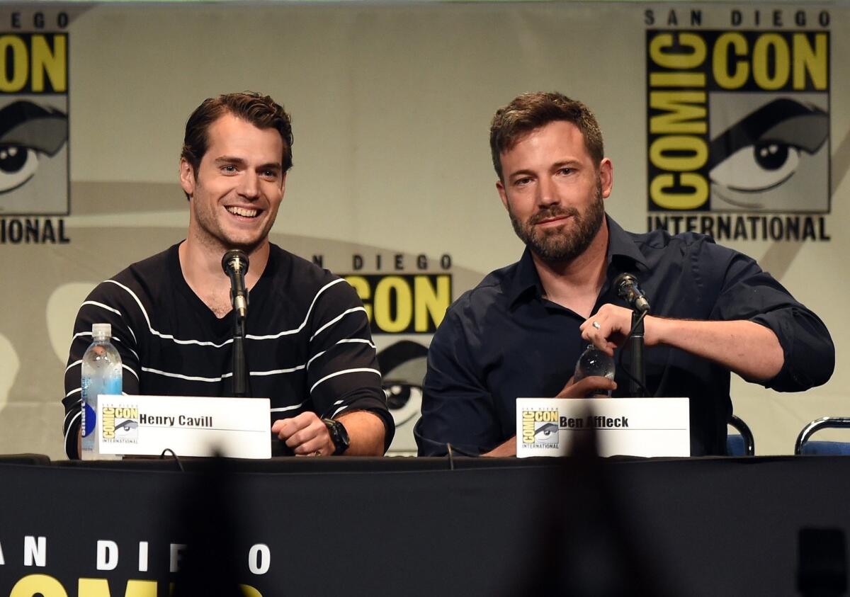 Actors Henry Cavill, left, and Ben Affleck at the Warner Bros. presentation at Comic-Con International on July 11, 2015. The stars were discussing the movie "Batman v Superman: Dawn of Justice."