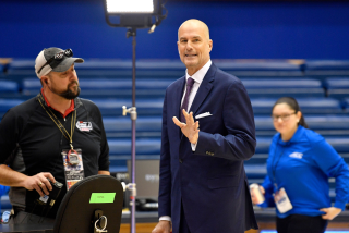 DURHAM, NORTH CAROLINA - MARCH 07: ESPN announcer Jay Bilas waves.