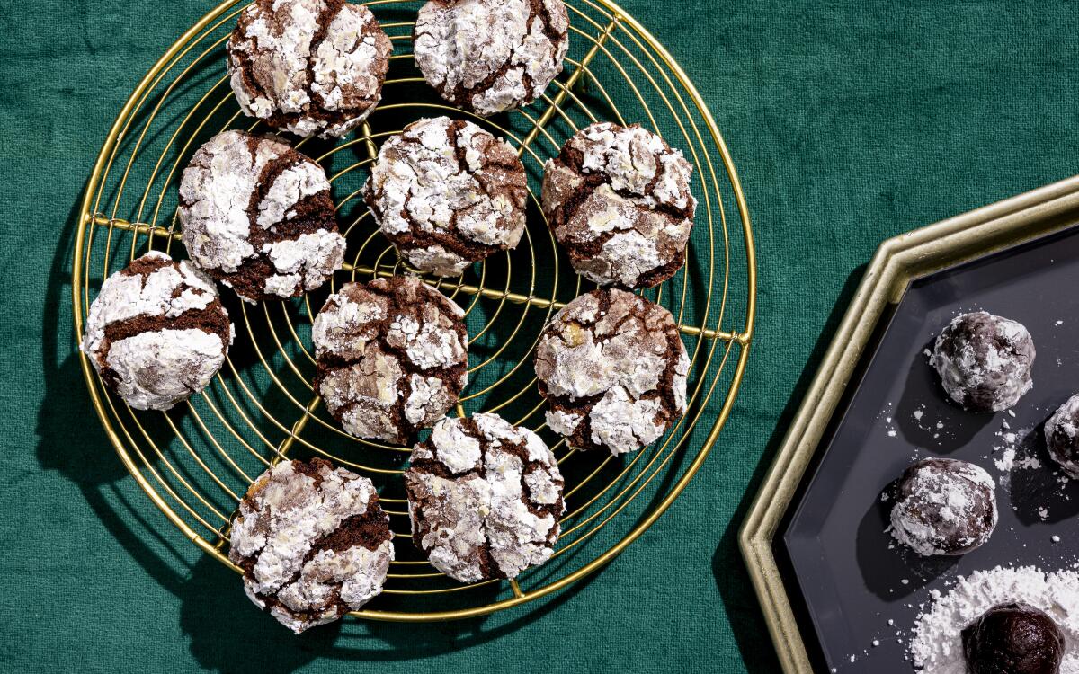 Sweet almond paste and anise-y licorice meld beautifully in this rich chocolate cookie with powdered sugar crinkles.