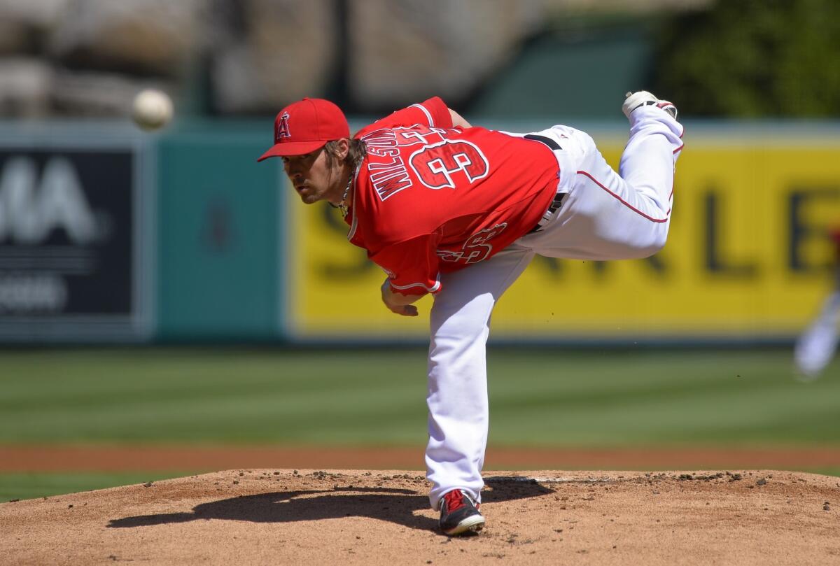 Angels starter C.J. Wilson went 8 1/3 innings in a 3-2 loss to the Seattle Mariners on Sunday.