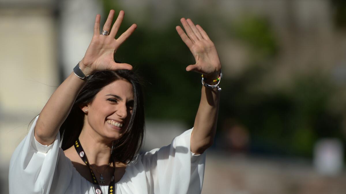 Virginia Raggi was elected Sunday as Rome's first female mayor, exit polls showed, in an electoral triumph for the populist Five Star Movement that represents a major setback for Italian Prime Minister Matteo Renzi.