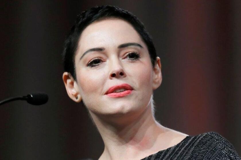 FILE- In this Oct. 27, 2017, file photo, actress Rose McGowan speaks at the inaugural Women's Convention in Detroit. A lawyer for Harvey Weinstein called actress McGowan's claims of rape against the former Hollywood producer are "a bold lie." McGowan details her allegations against Weinstein in her new book "Brave," released Tuesday, Jan. 30, 2018. (AP Photo/Paul Sancya, File)