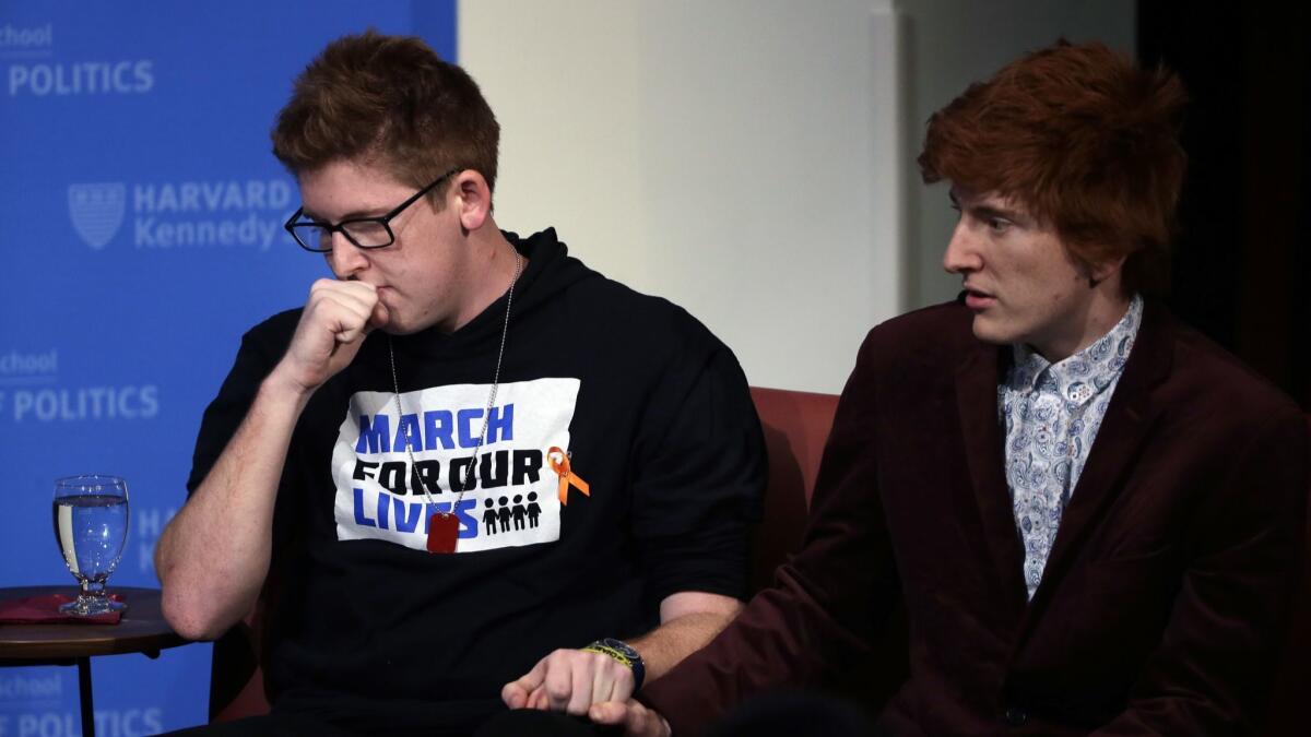 Marjory Stoneman Douglas High School students Matt Deitsch, left, and Ryan Deitsch participated in a panel discussion about guns on Tuesday at Harvard in Cambridge, Mass.
